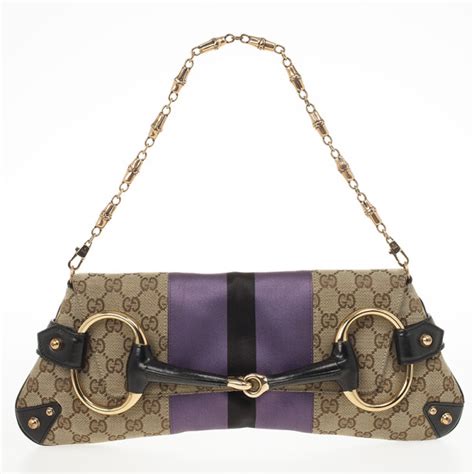 gucci monogram clutch|gucci chain clutch.